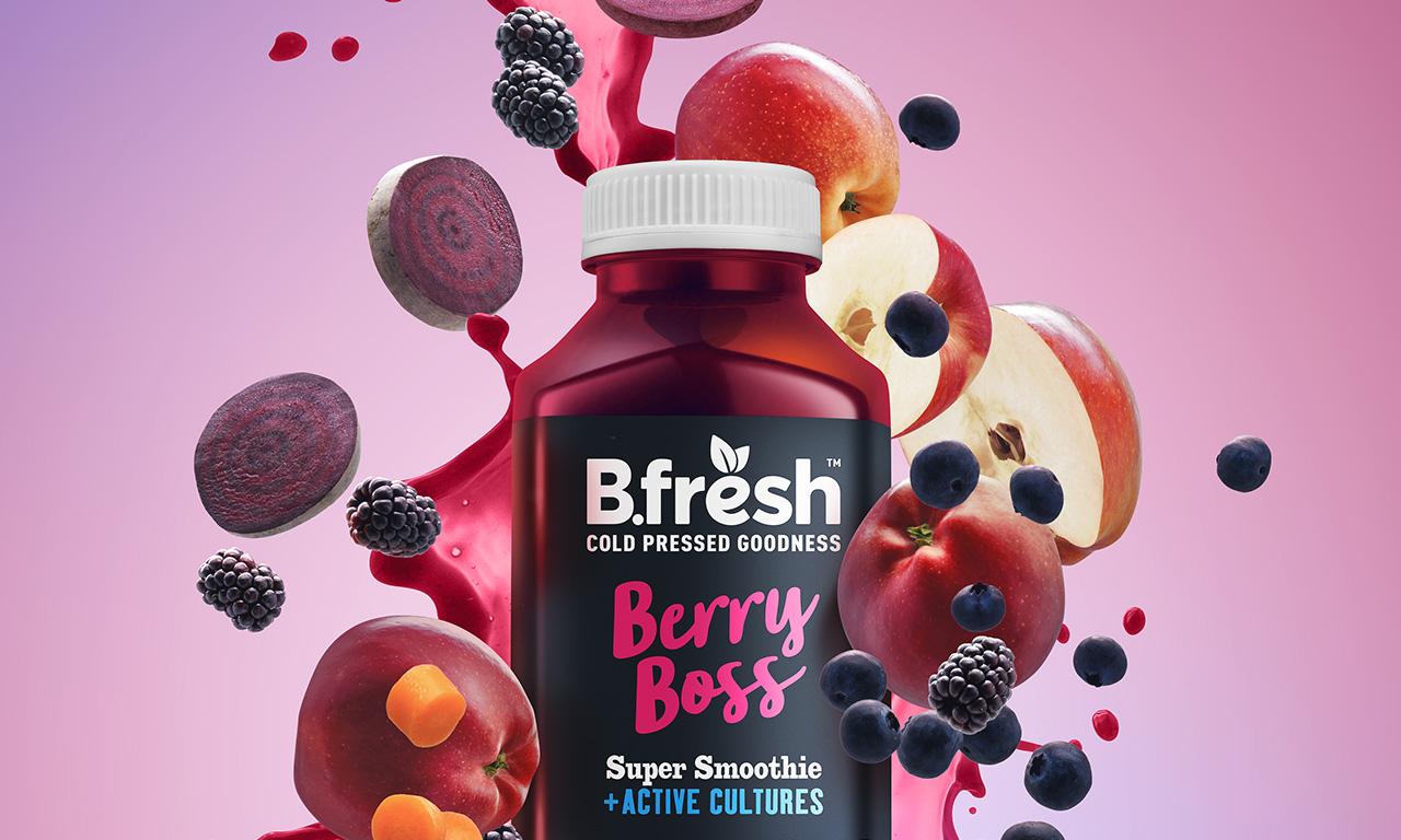 Berry juice bottle - creative retouching and post-production - vibrant fruit splash